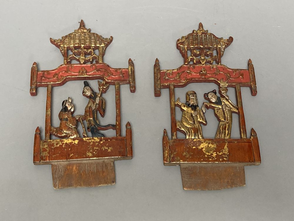 A group of Chinese lacquered wood carvings, tallest 40cm